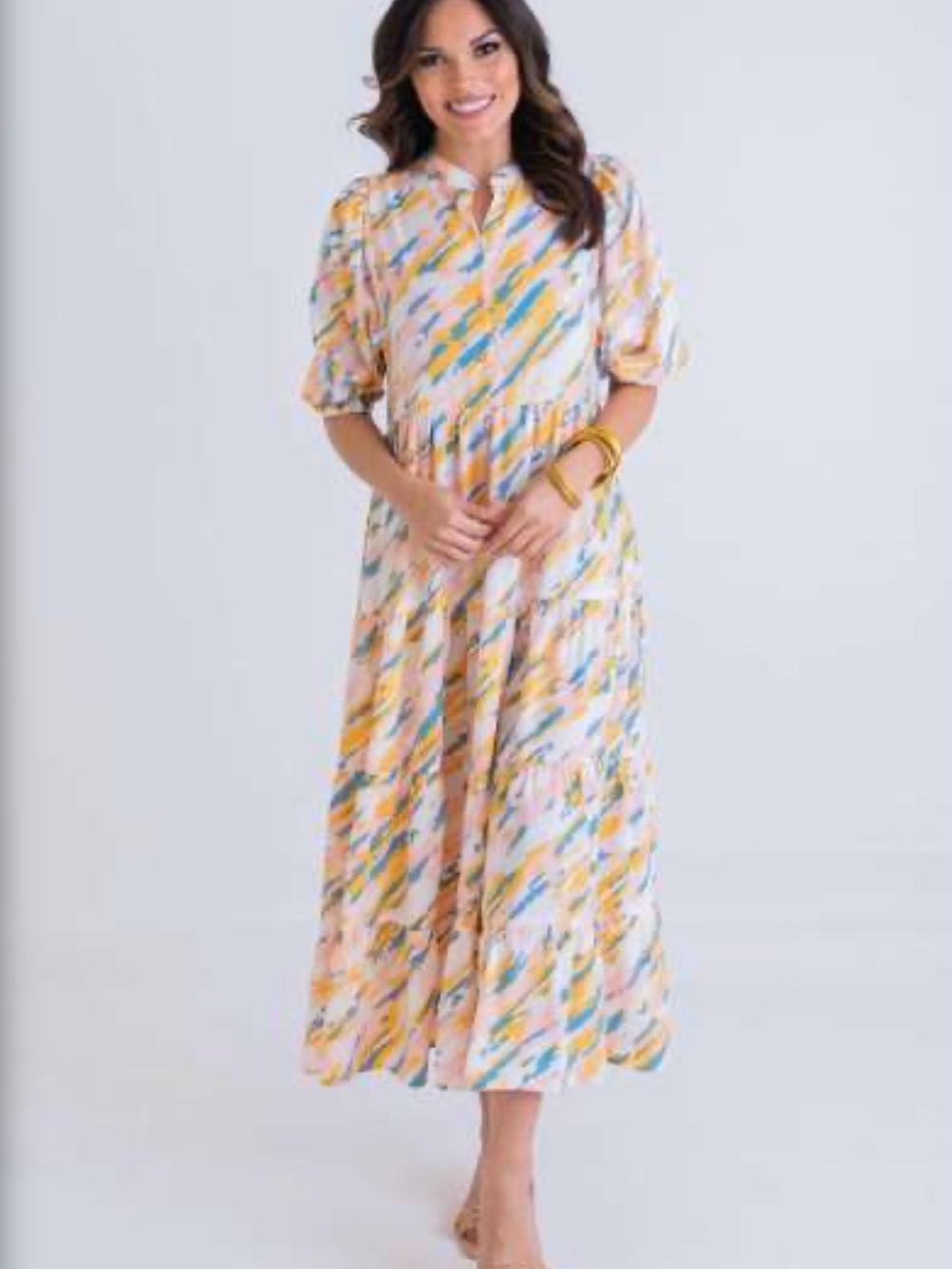 Karlie Abstract Puff Sleeve Tier
Midi Dress